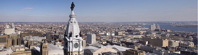 An aerial view of Philadelphia with a clock tower in the foreground