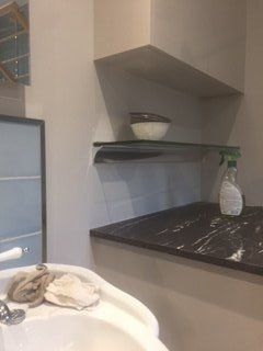 Toughened glass shelves