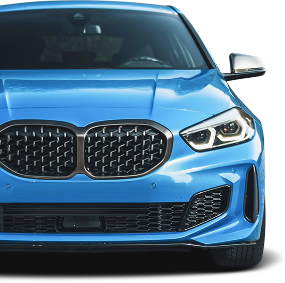 A blue car with a black grill on the front