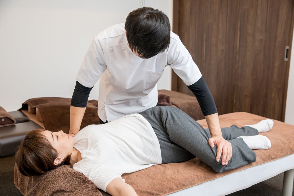 A Man Doing Chiropractic — Back Care Gold Coast In Nerang, QLD