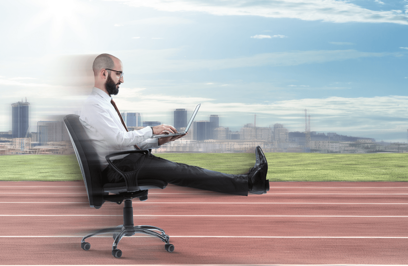 picture of executive in office chair on a race track