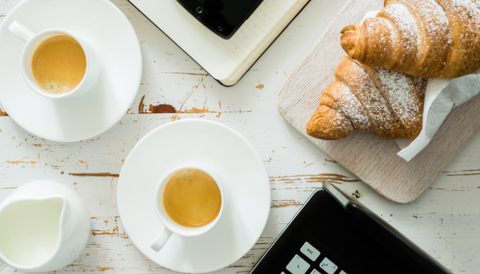 picture of  catered business meeting with pastries and coffee