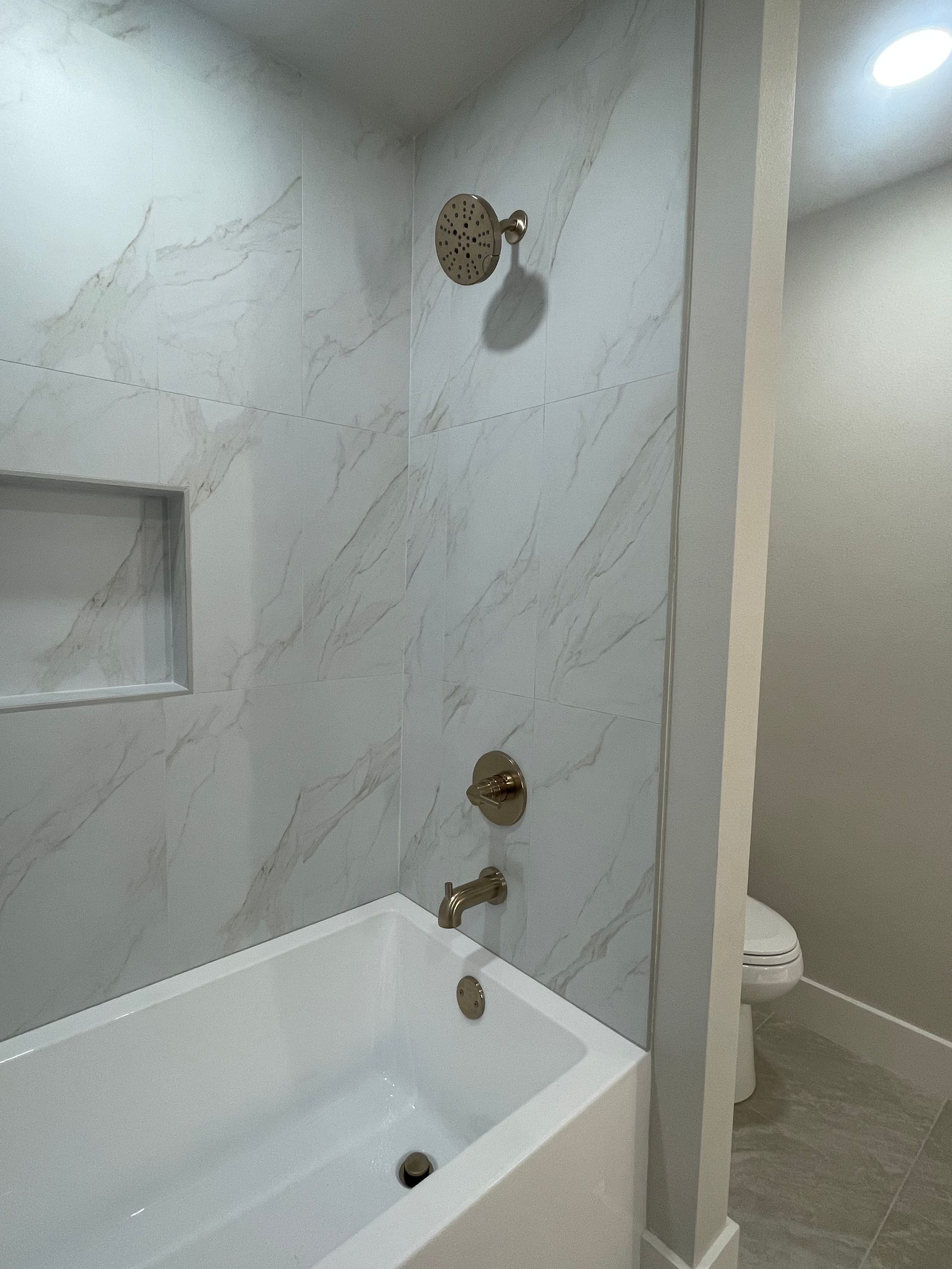 A plumbing bathroom remodel in Rogers, AR by Masters of Disasters Leak Detection