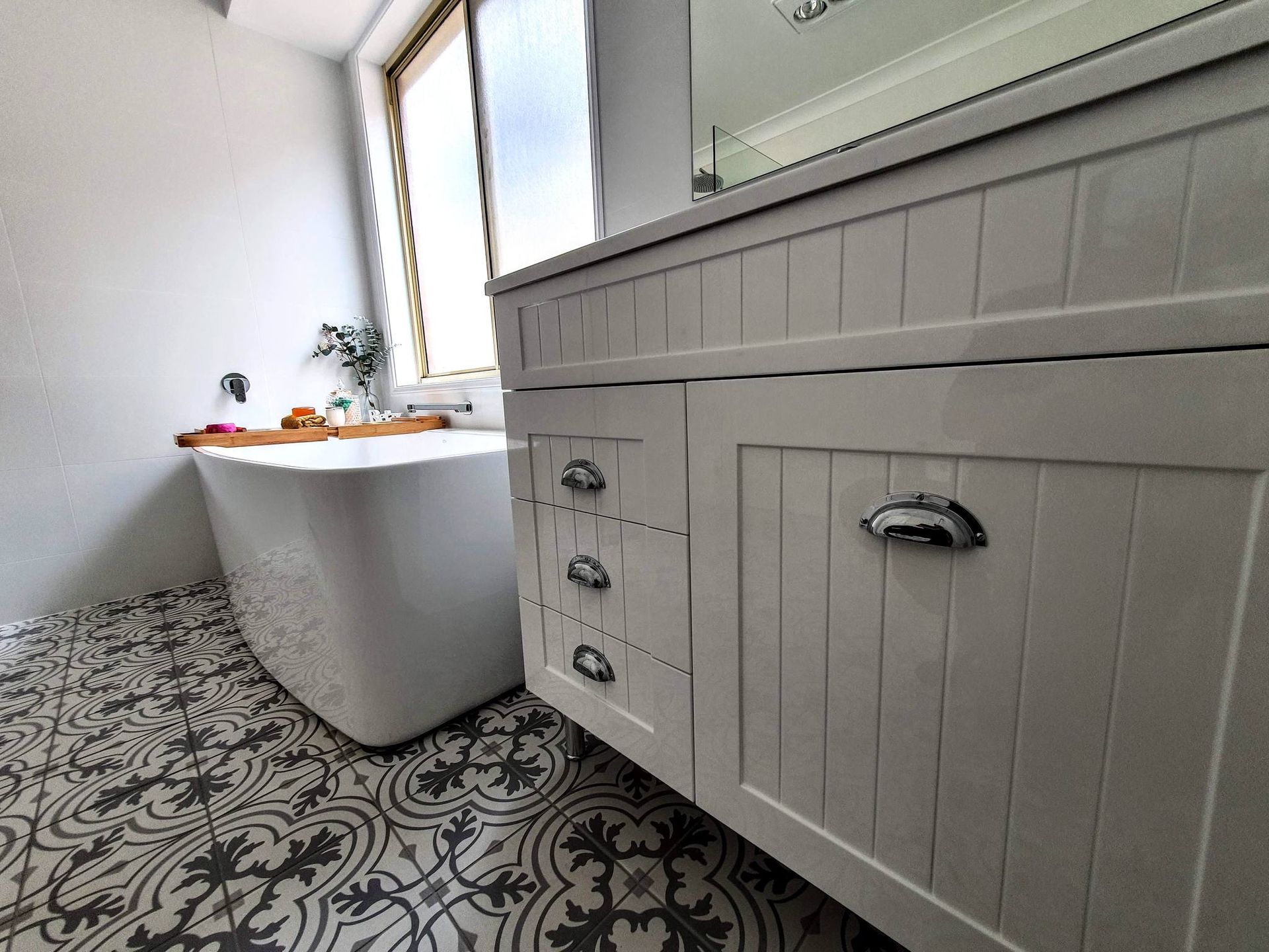 A large room with a wooden floor and a lot of furniture in it.