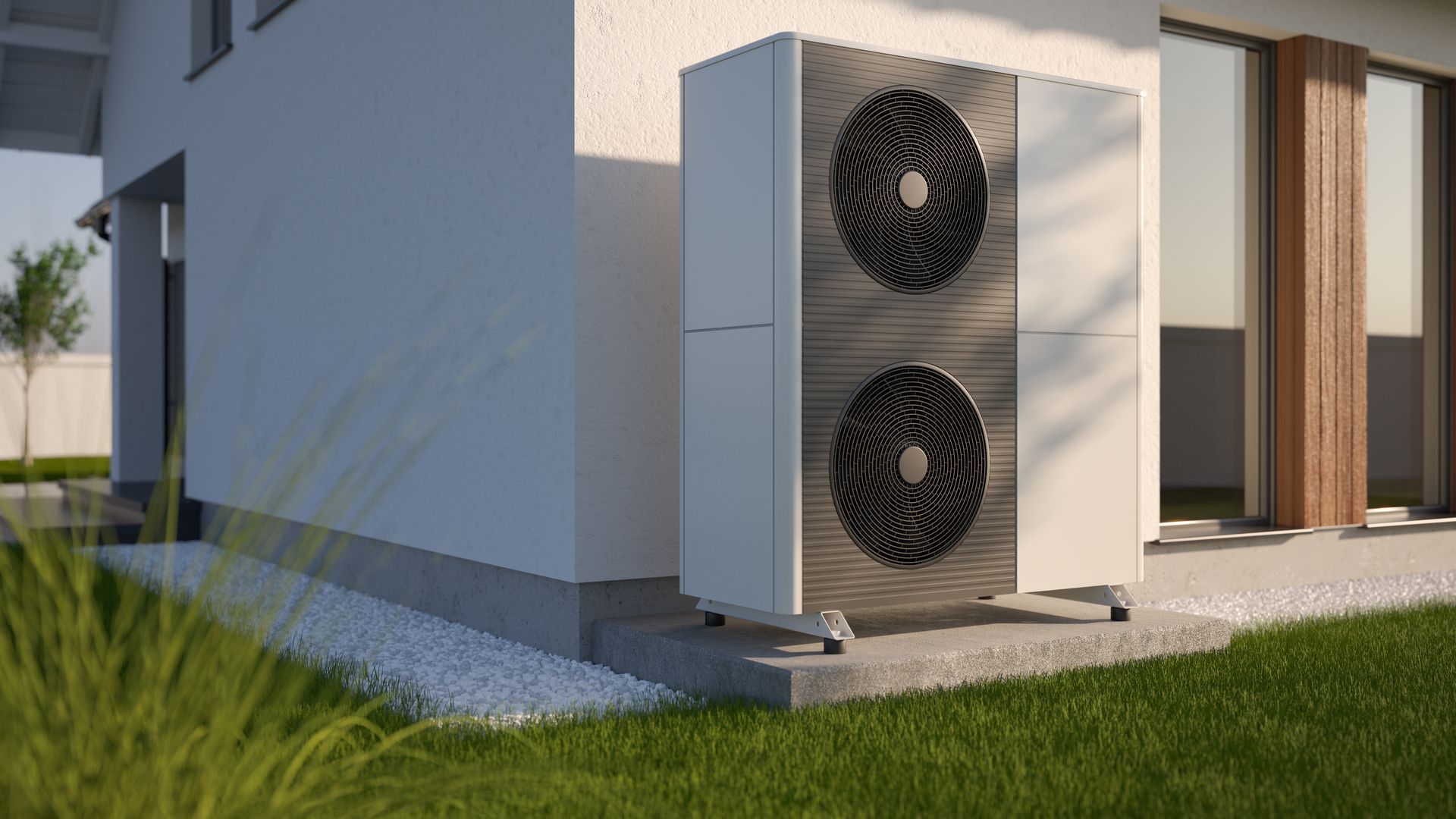 A large air conditioner is sitting on the side of a house.