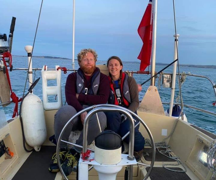 Amy and John Gower on their solar, battery and wind boat