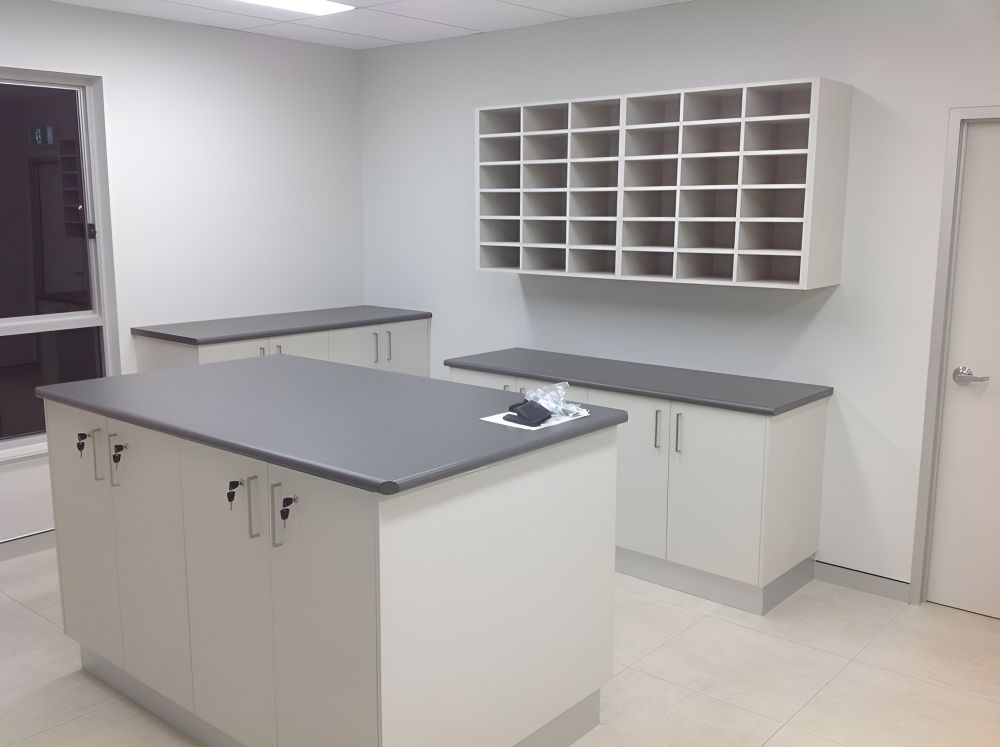 A Kitchen With A Large Island And Lots Of Shelves — Gavin Cummings Kitchens in Dubbo, NSW