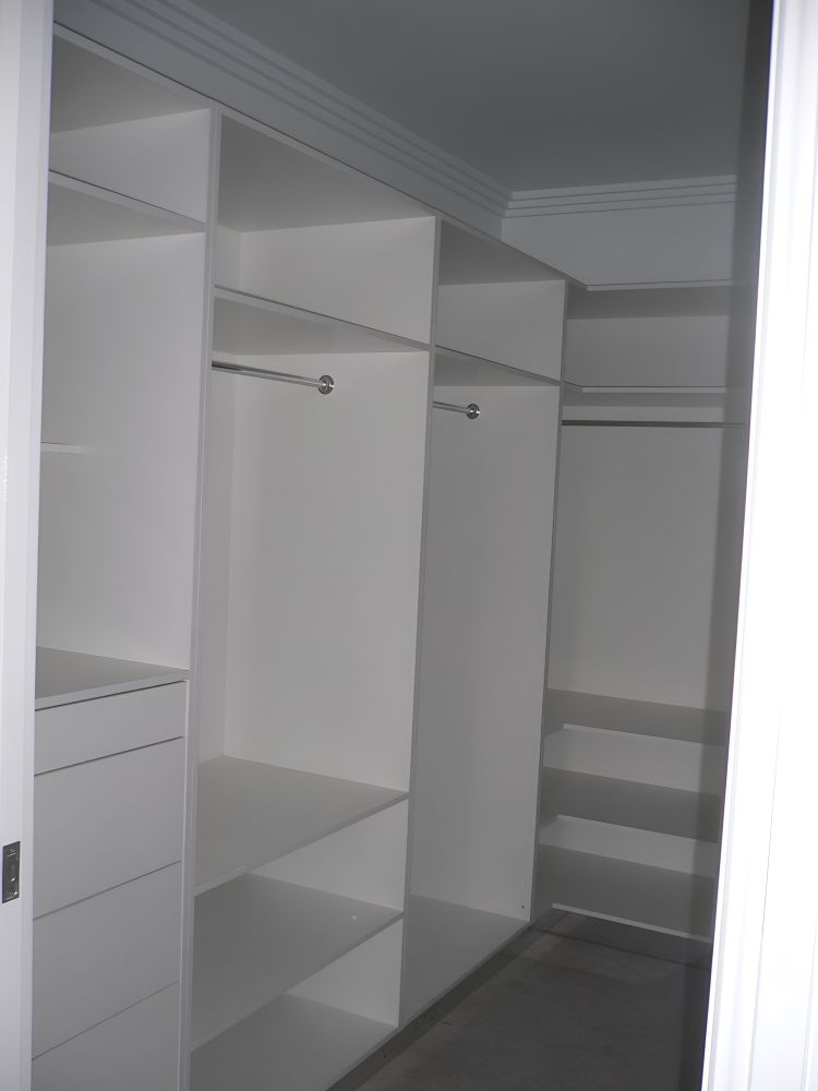 A Walk In Closet With Lots Of Shelves And Drawers — Gavin Cummings Kitchens in Dubbo, NSW