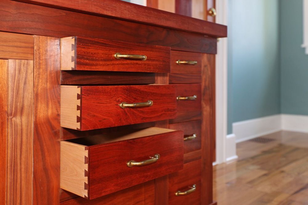 A Close Up of a Wooden Dresser With Drawers Open — Gavin Cummings Kitchens in Nyngan, NSW