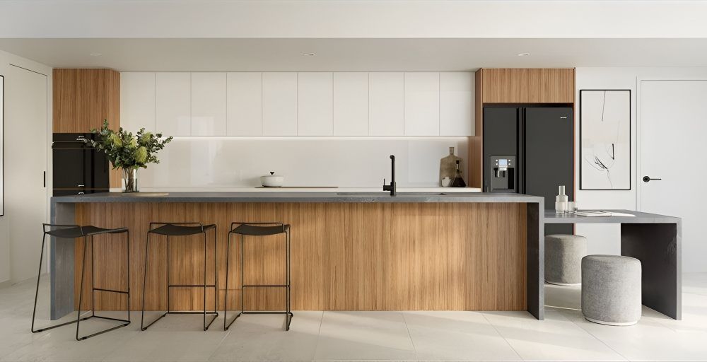 A Kitchen With White Cabinets And Black Refrigerator — Gavin Cummings Kitchens in Wellington, NSW