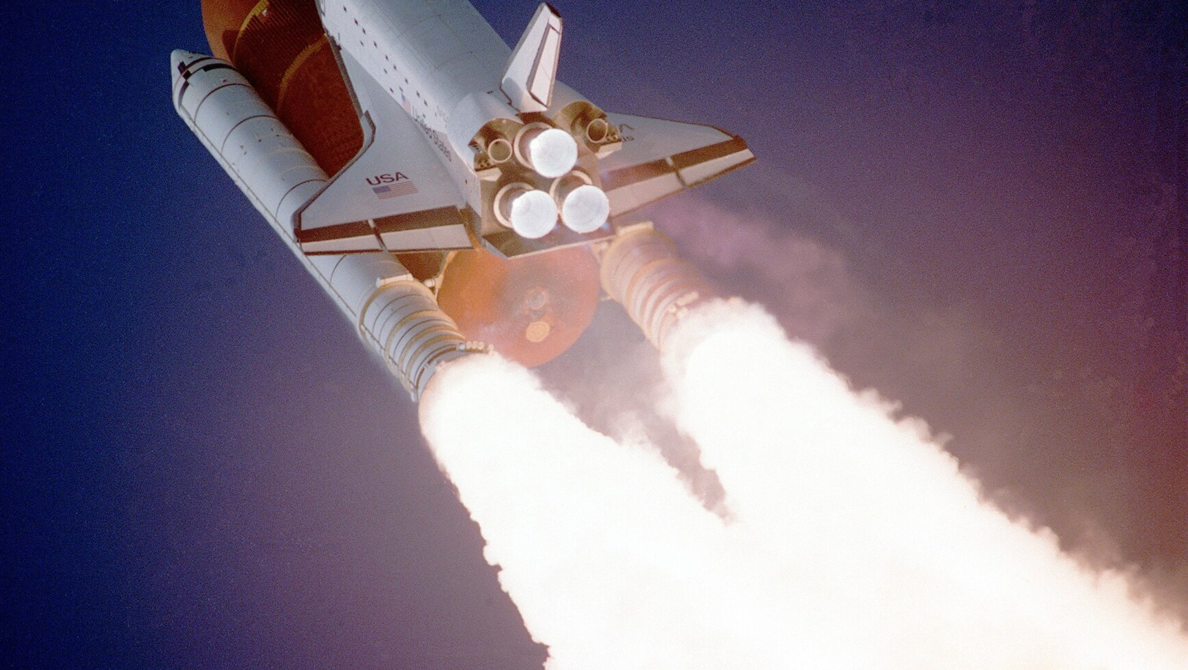 A voyager rocket, white hot fuel tanks blasting through the atmosphere into space