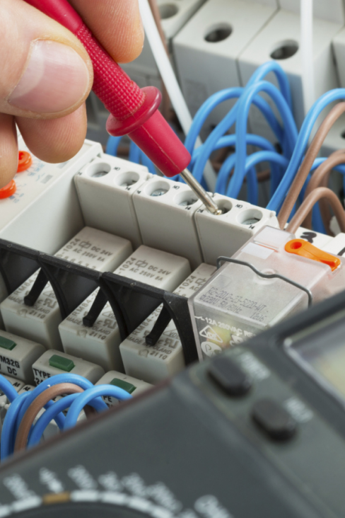 One of our technicians performing electrical services in Cairns
