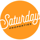 Orange circle with white script "Saturday Properties" and smaller text "PROPERTIES."