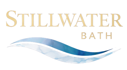 Stillwater Bath logo with gold text and blue wave swoosh on white background