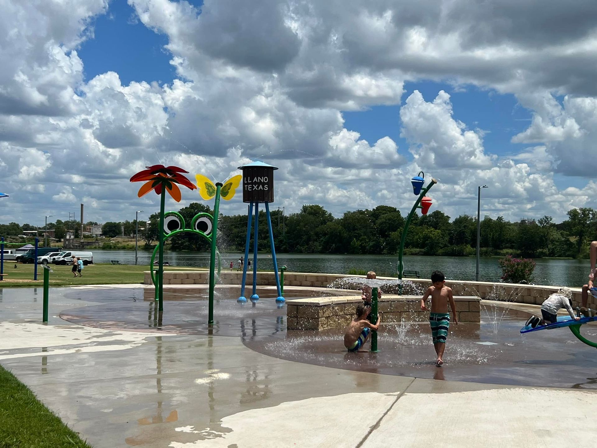 A group of children are playing in a water park.