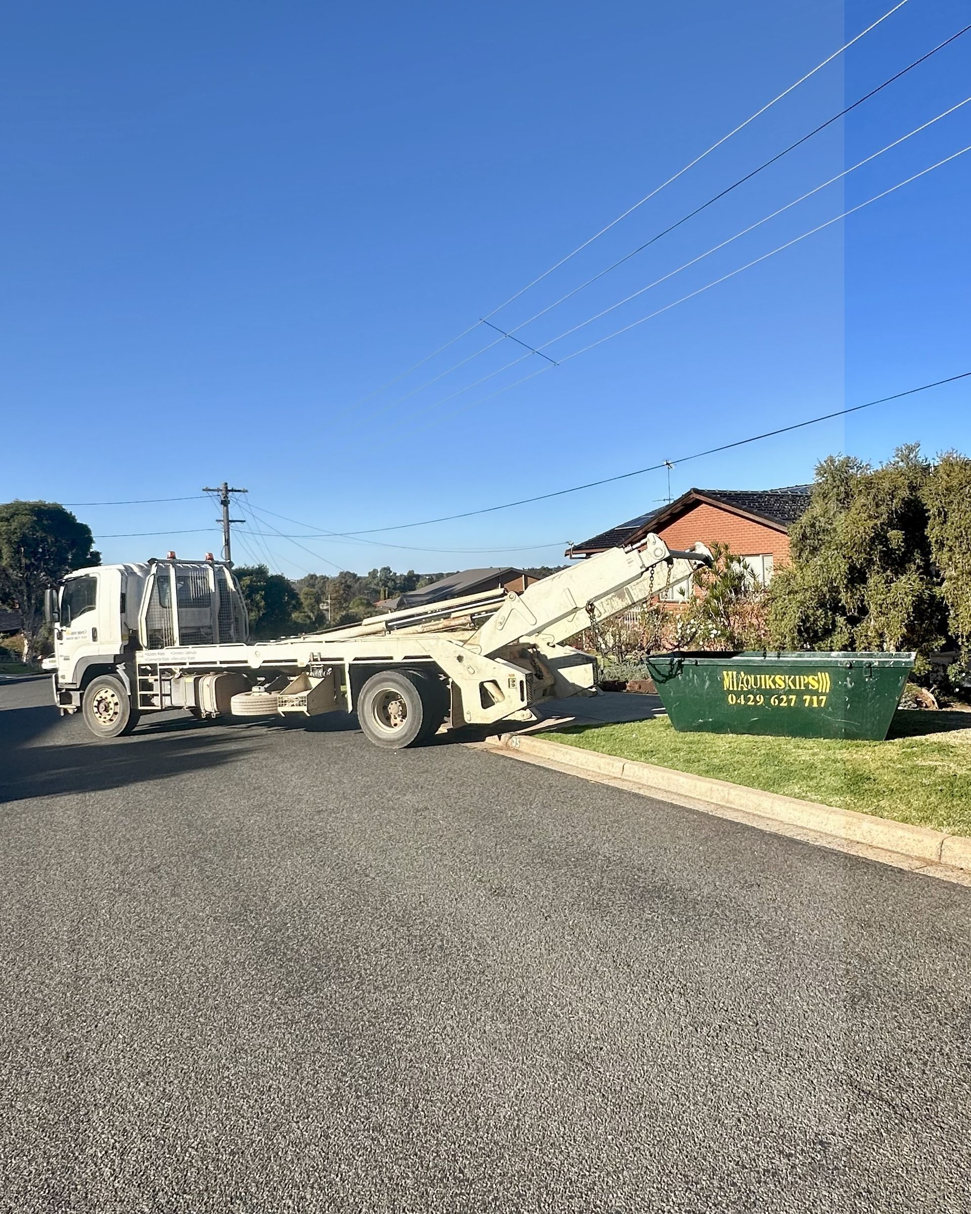 Hook lift bin delivery to residential project – MIA Quikskips Griffith