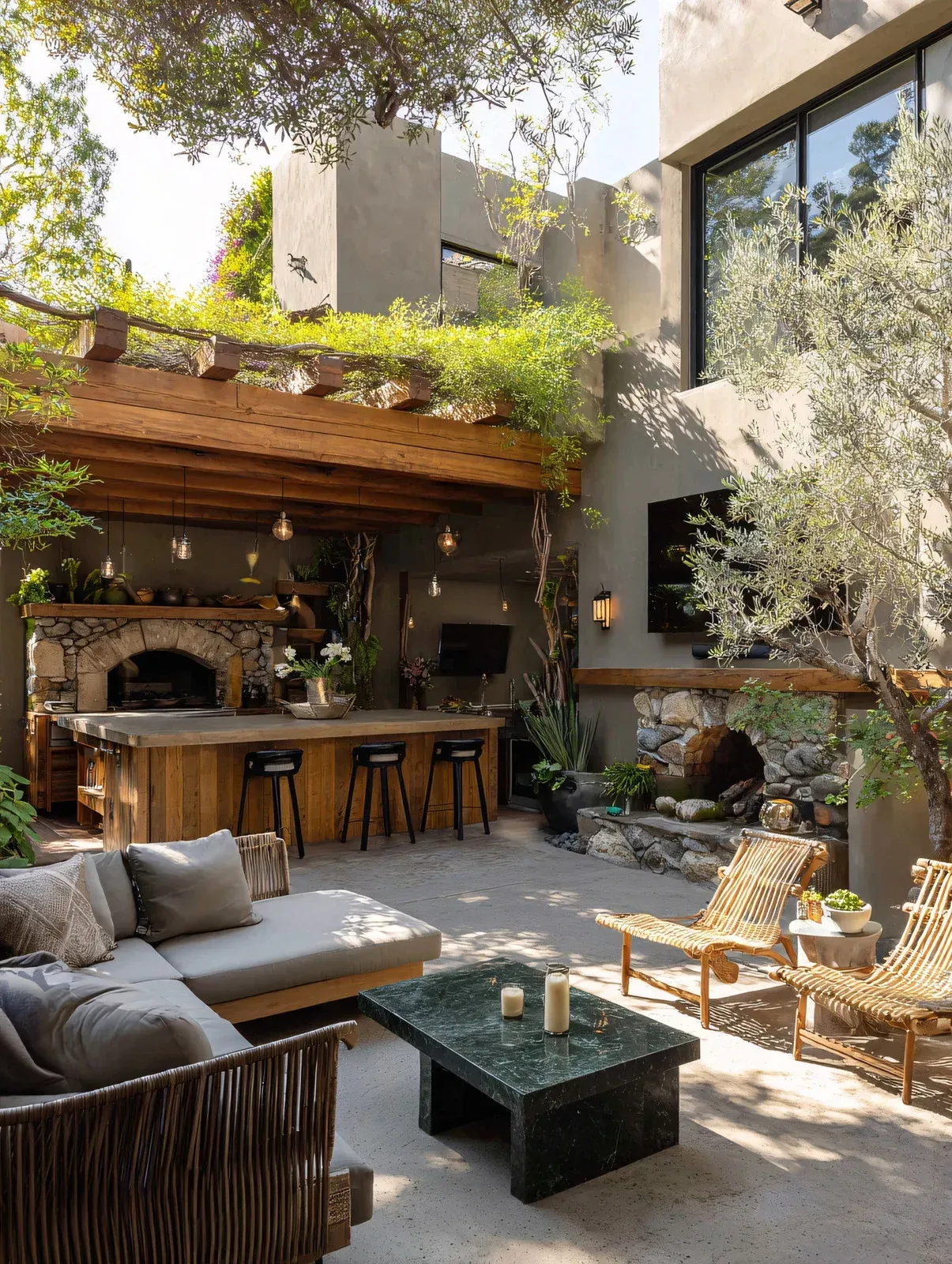 Kitchen with white cabinets, speckled countertop, stainless steel sink and appliances, and dark tile backsplash.