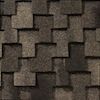 A close up of a roof made of wooden shingles.