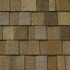 A close up of a row of wooden shingles on a roof.