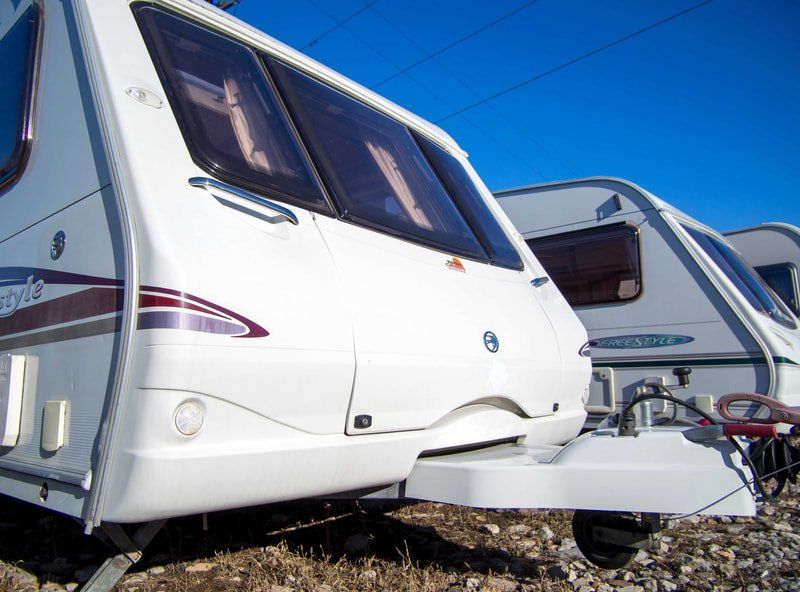 White RVs parked closely