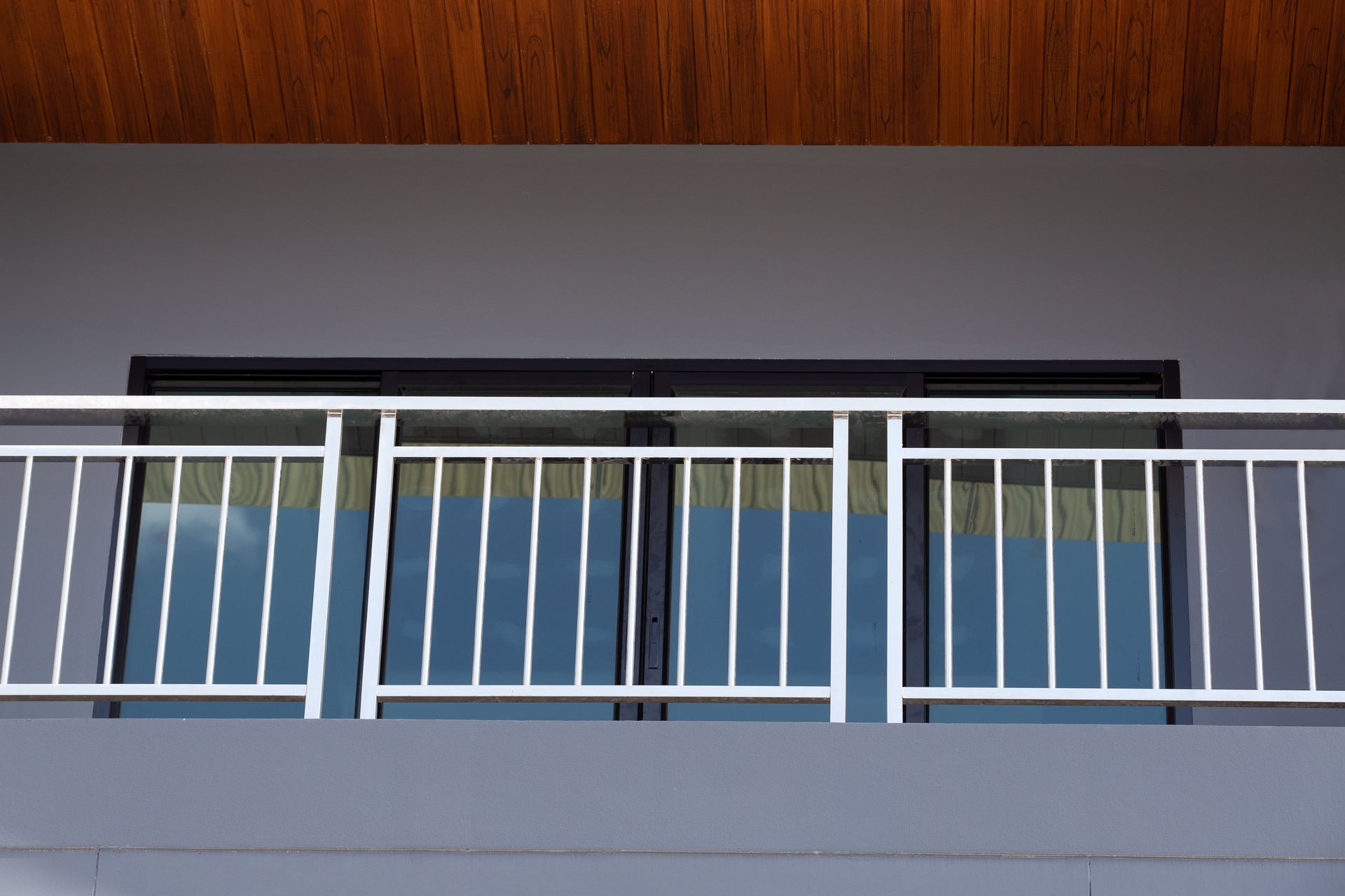 Railings in balcony of house