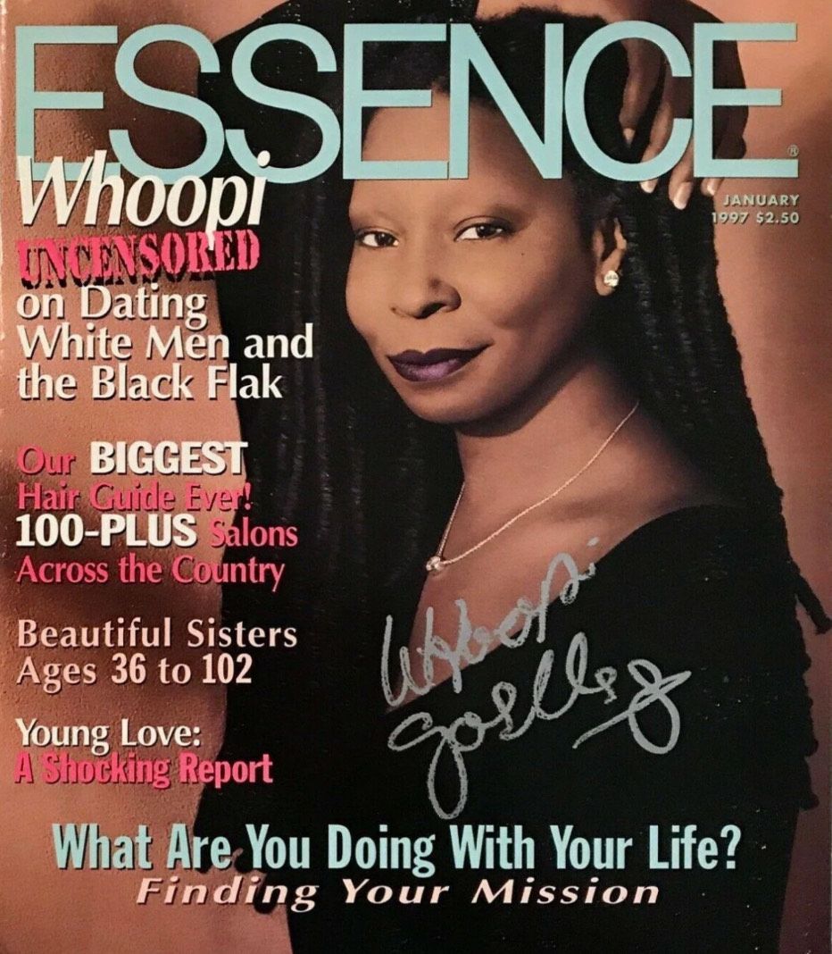 A signed copy of essence magazine with a woman on the cover
