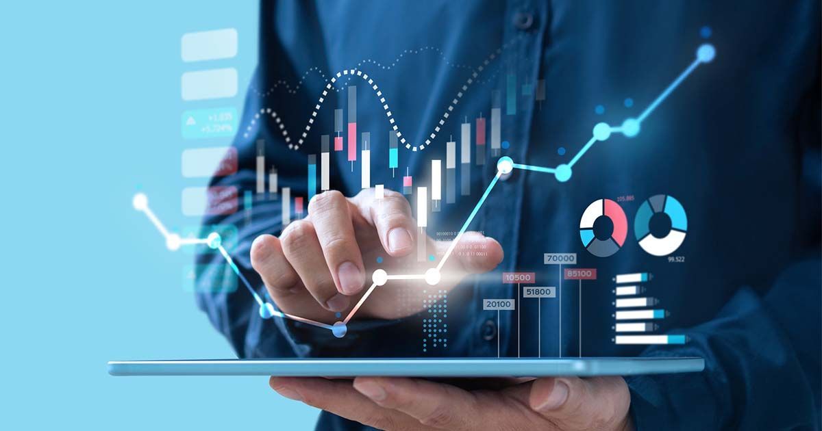 Modern building exterior with layered geometric panels in white and blue.