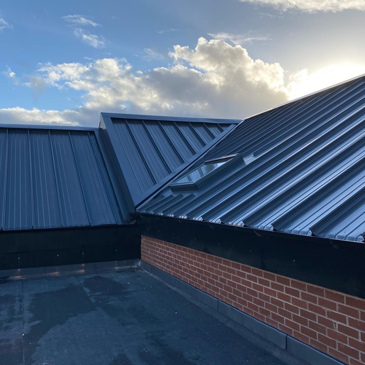 replacing old asbestos roofing