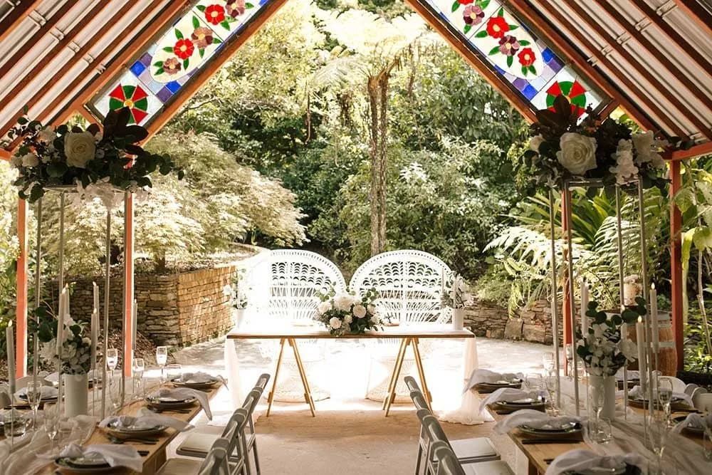 A Long Table and Chairs Under a Stained Glass Canopy — Central Coast Events in Sydney, NSW