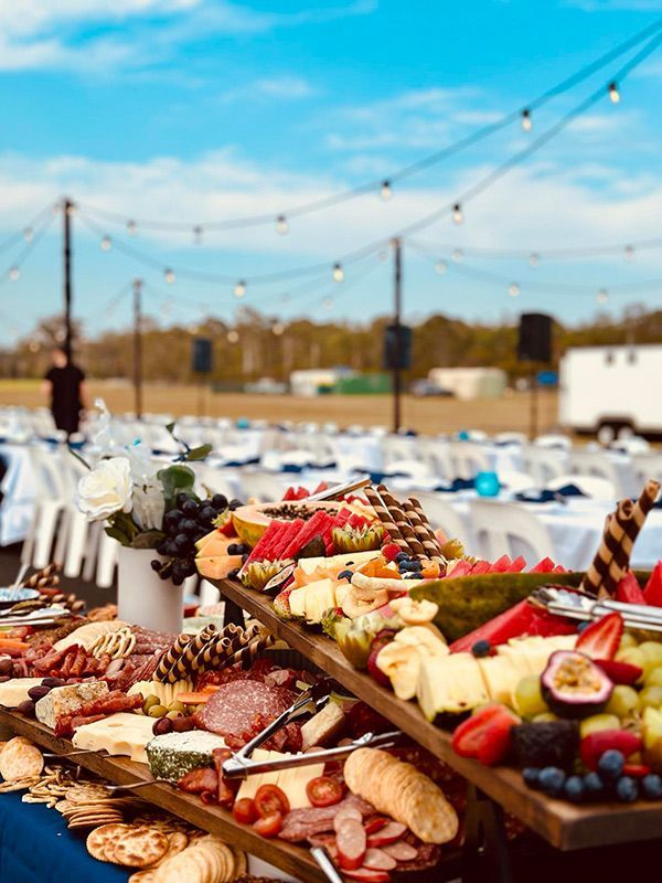 A Buffet Table Filled With Lots of Food and Fruit — Central Coast Events in Berkeley Vale, NSW