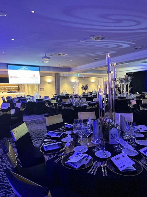 A Large Room With Tables and Chairs Set Up for a Banquet — Central Coast Events in Berkeley Vale, NSW