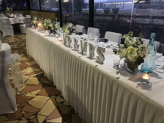A Long Table With a Sign That Says Mr. and Mrs. on It ― Central Coast Events in Berkeley Vale, NSW
