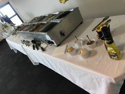 A Long Table With a Bunch of Bowls of Food on It ― Central Coast Events in Berkeley Vale, NSW