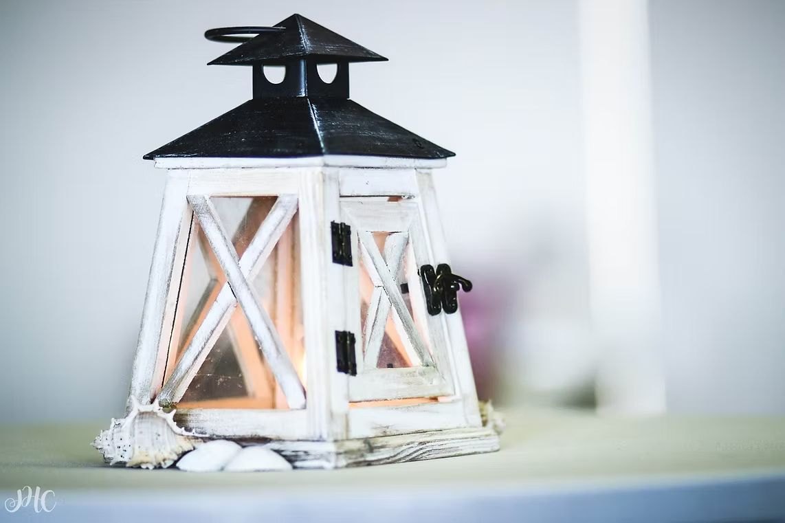 A White and Black Lantern is Sitting on a Table ― Central Coast Events in Berkeley Vale, NSW