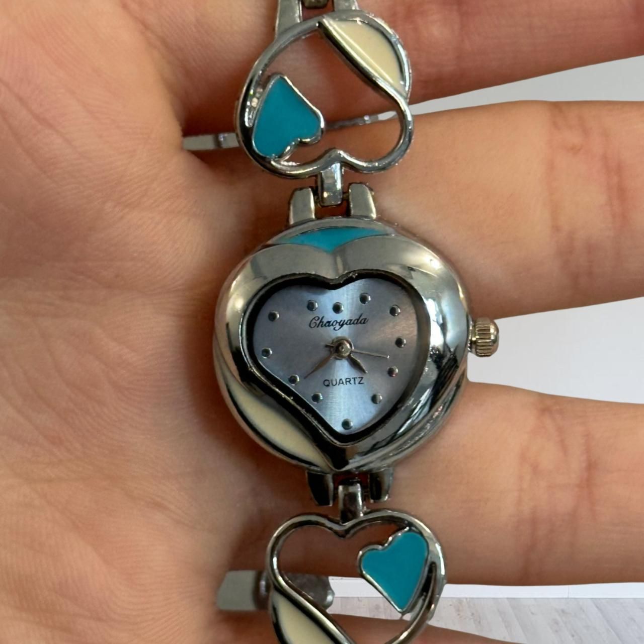 silver and blue heart watch