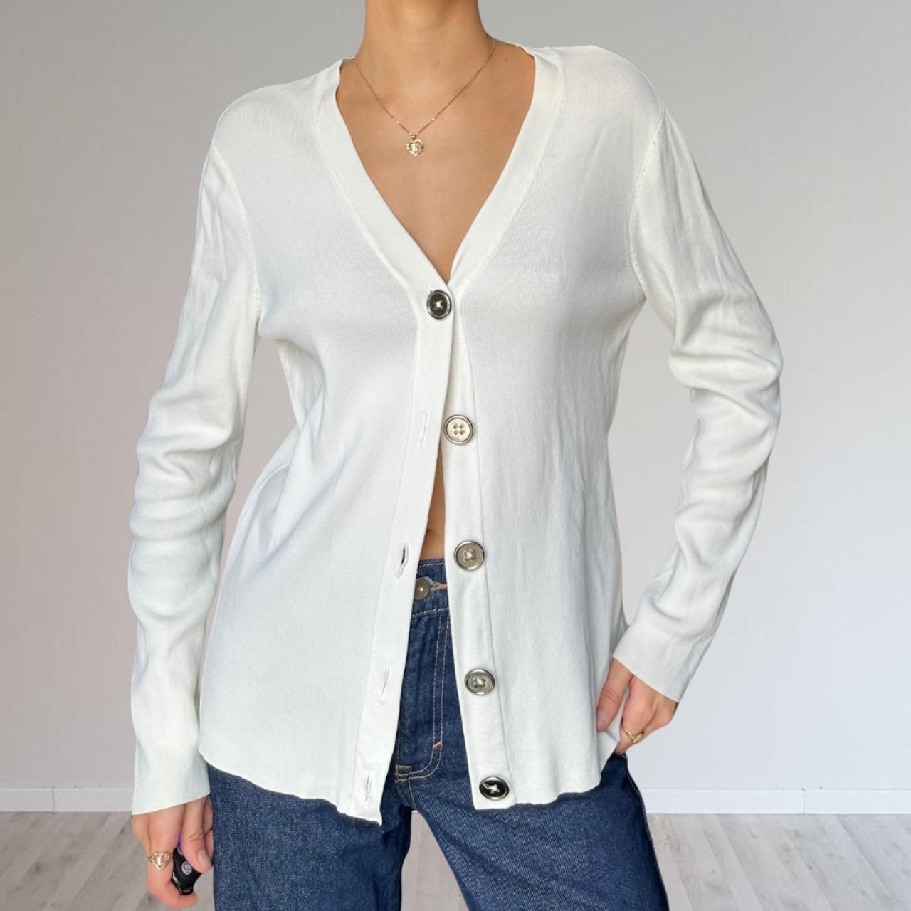 white cardigan with metal buttons