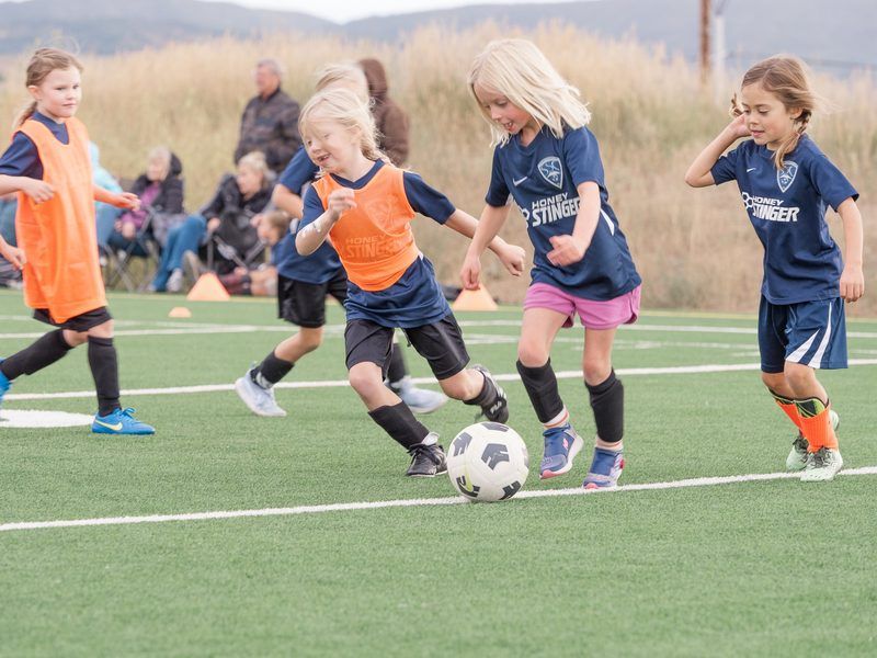 Young girls scrimmaging
