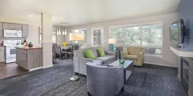 A living room filled with furniture and a flat screen tv.