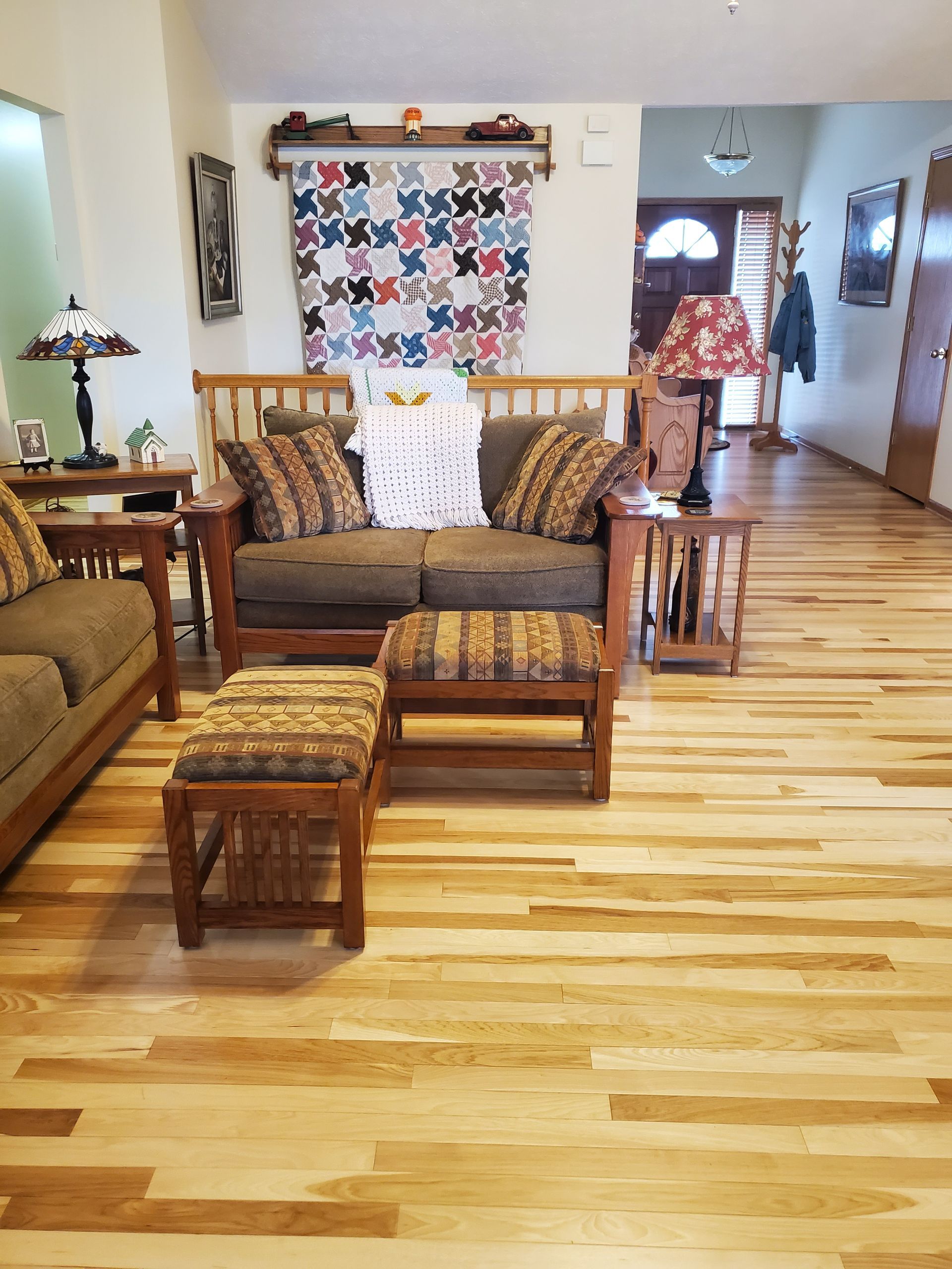 Living Room With Floors, a Couch, and Chairs — Omaha, NE — Ohana Wood Floors Inc.