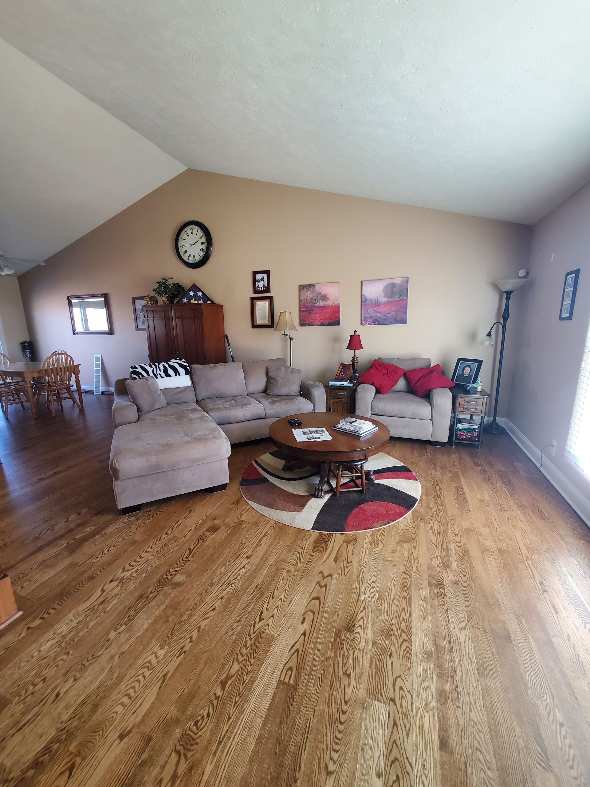 A Living Room With Hardwood Floors — Omaha, NE — Ohana Wood Floors Inc.