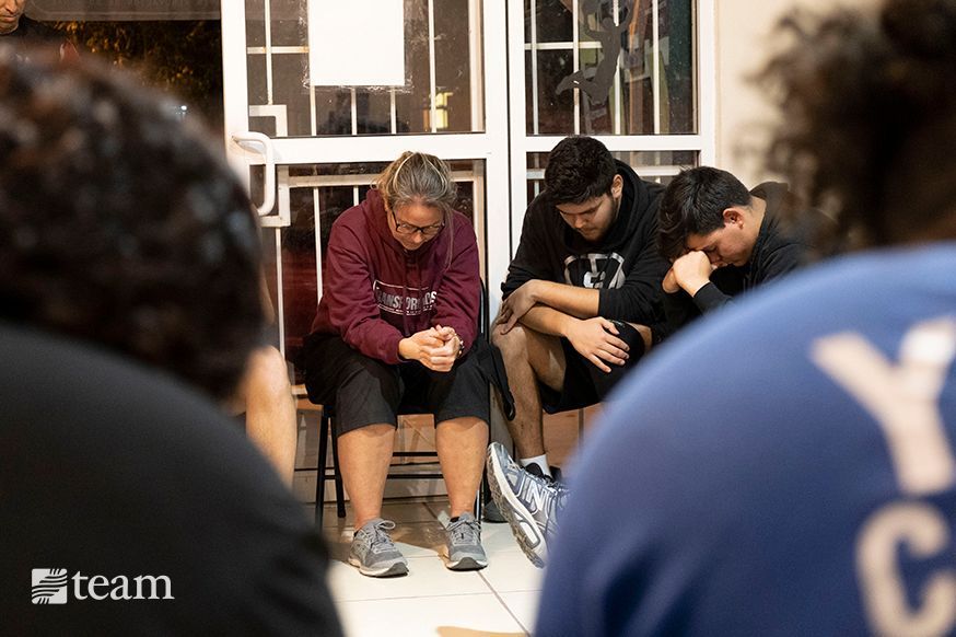 After practice, the teens gather for a time of Bible discussion and prayer, allowing them to draw near to God and ask questions.