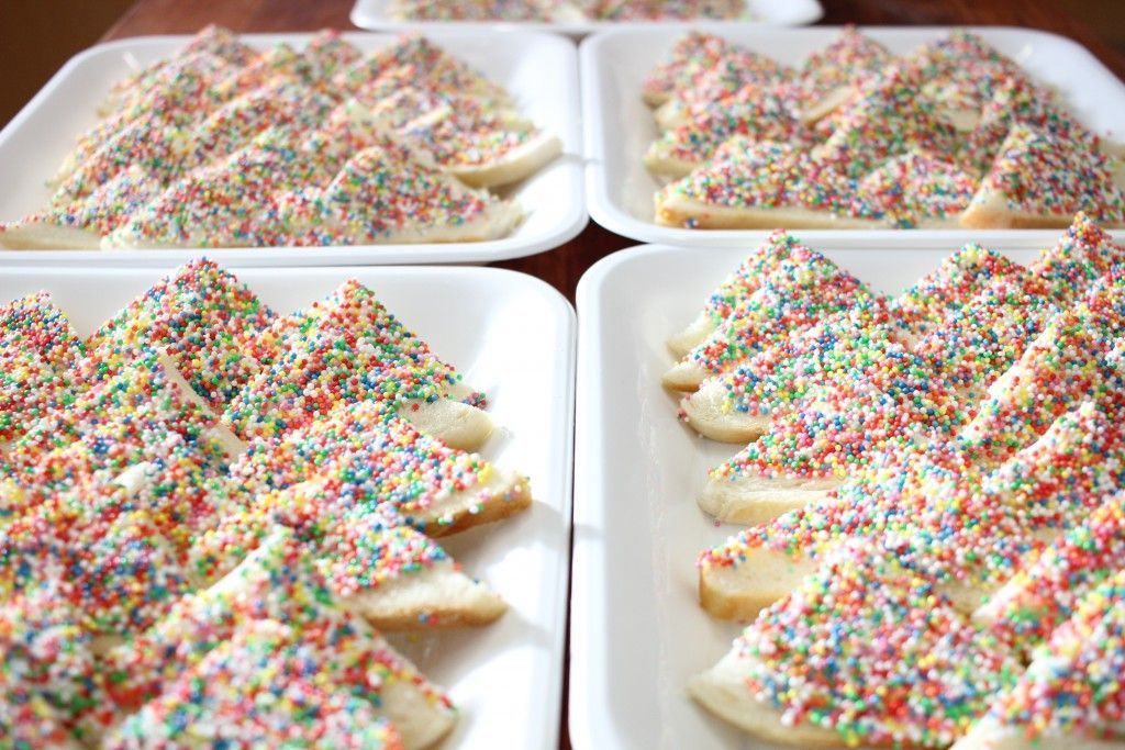 I have learned that every Australian birthday has to have fairy bread. Fairy bread is literally a slice of bread cut into fourths, covered in butter, and then dipped into color-coated sprinkles. So, sugar bread. 