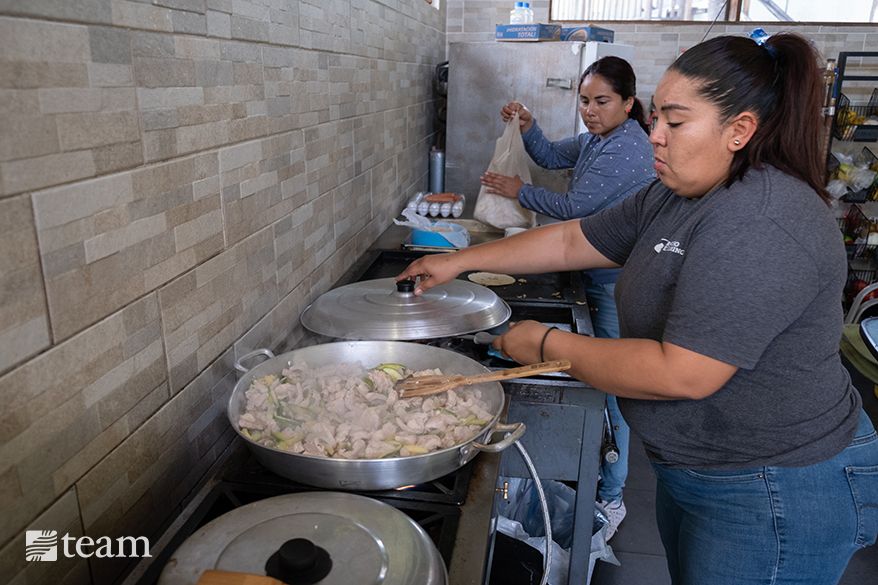 While serving at the food kitchen, Gaby became curious about God. After the kitchen closed, Gaby started volunteering to cook at Rancho el Camino events.