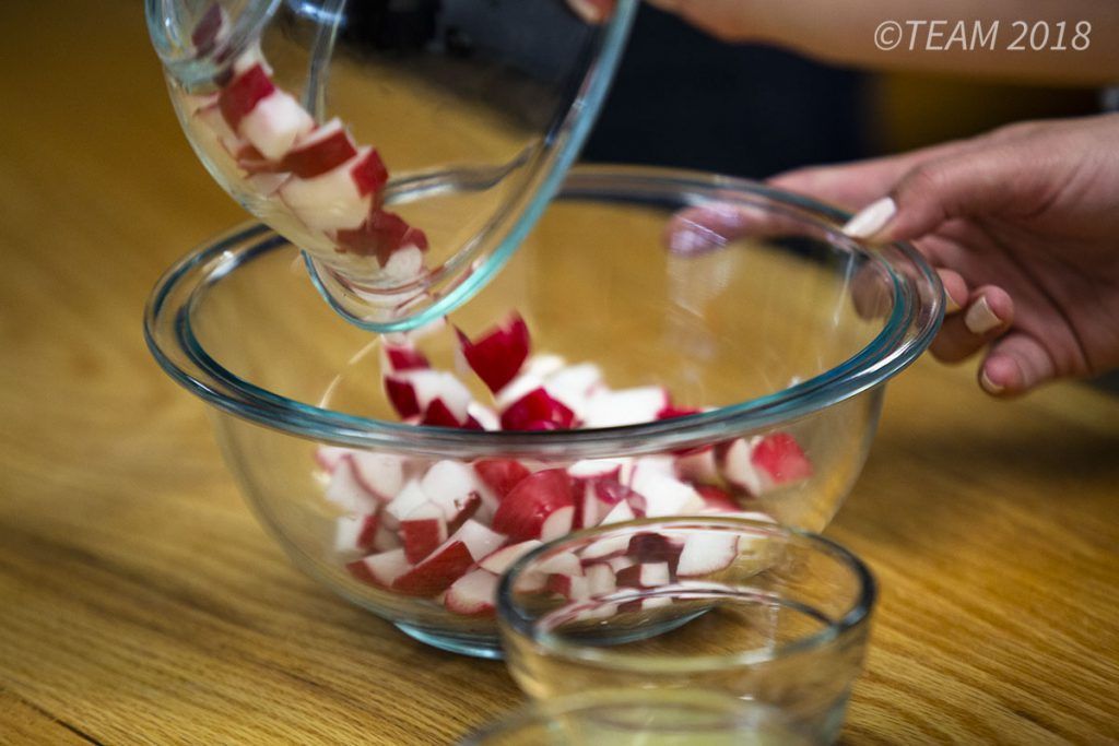 Pour the chopped radishes into a bowl