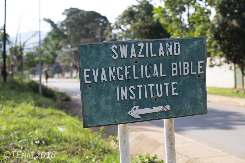 A sign points out the direction to Swaziland Evangelical Bible College