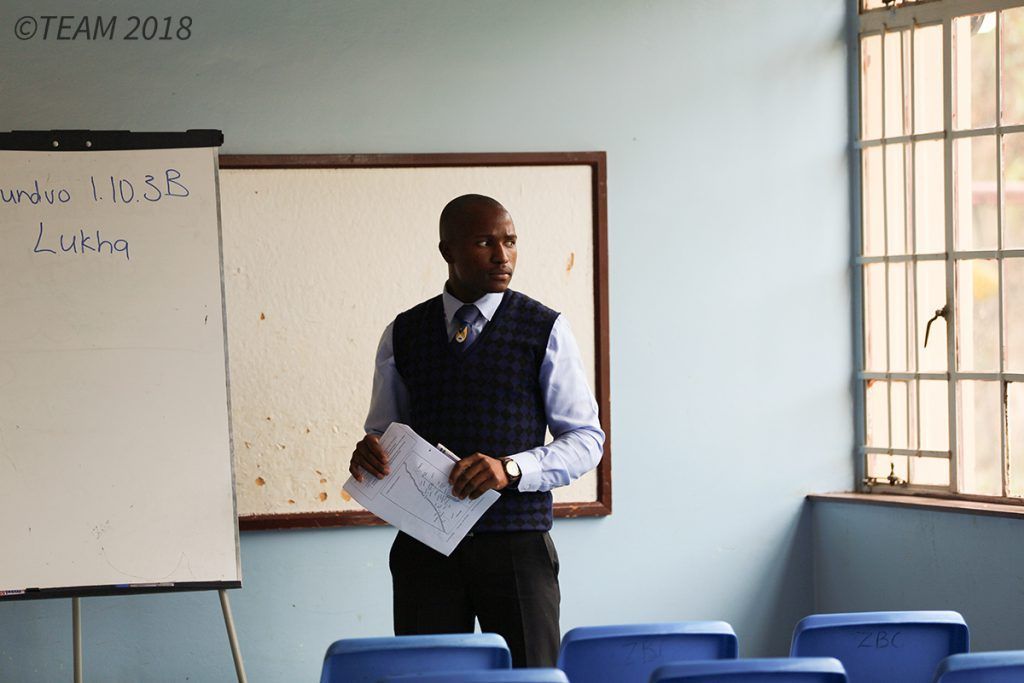 A professor at a Bible college prepares for class.