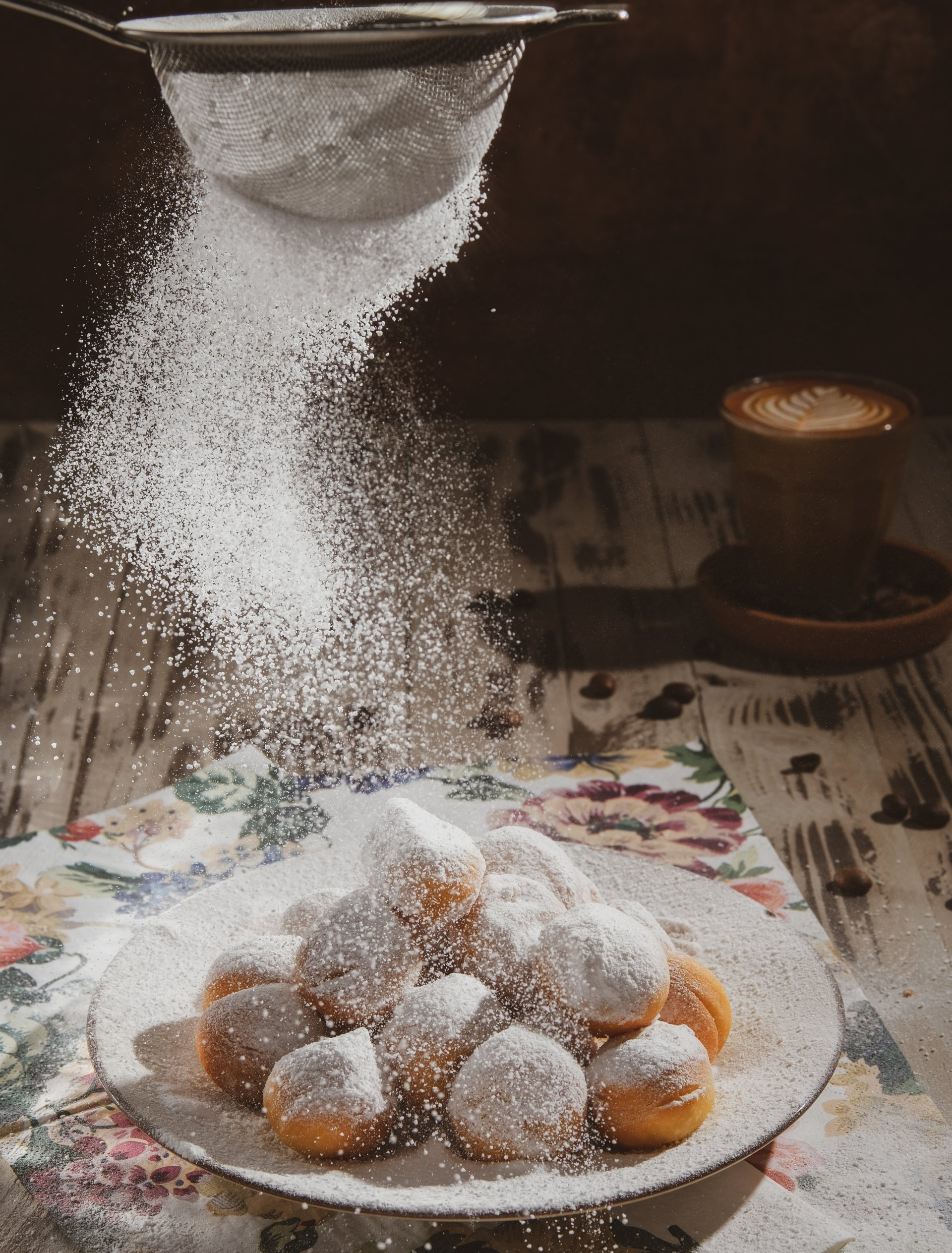 Indiana Sugars, a bulk powdered sugar supplier, powdered sugar being sifted on beignet's. 