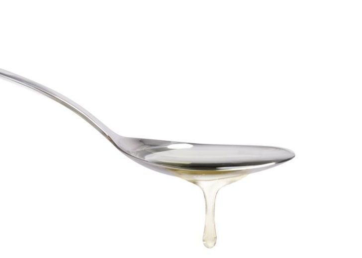 spoonful of glucose syrup, showing glucose syrup vs corn syrup