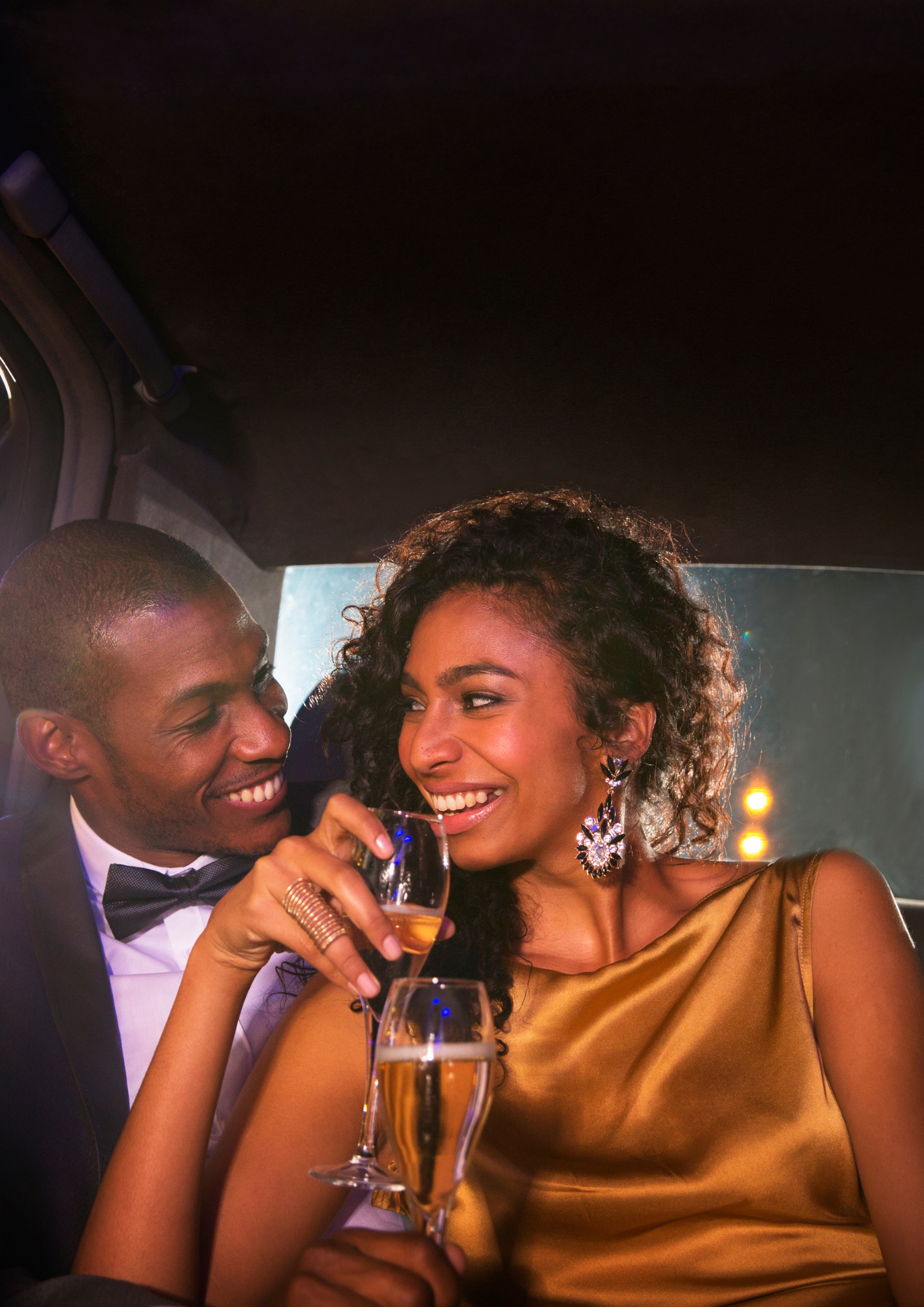 A couple inside a limousine