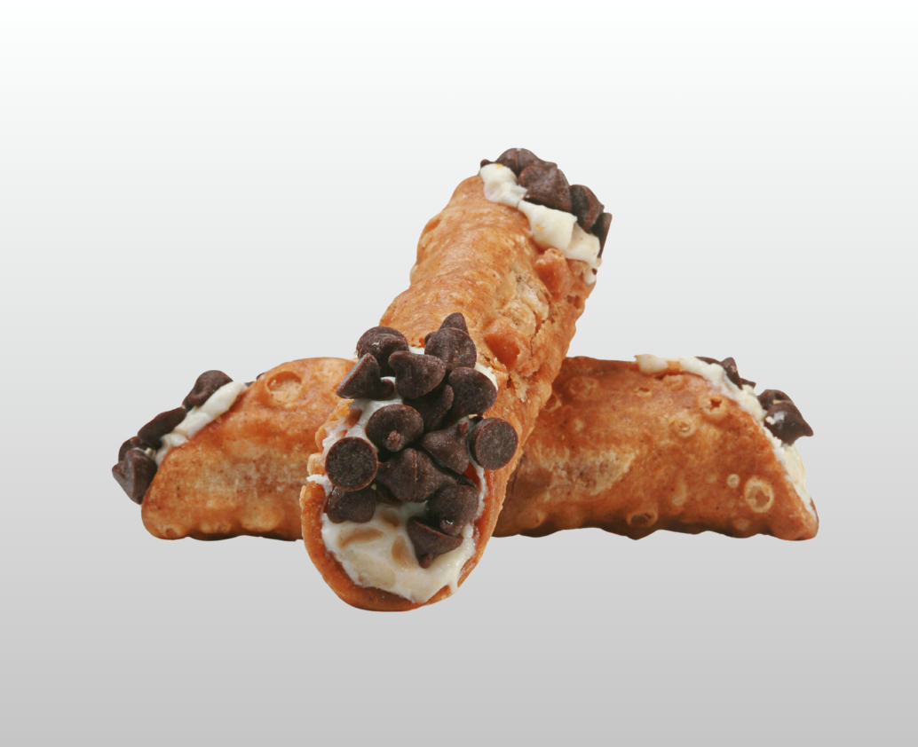 Two cannoli with chocolate chips on top 